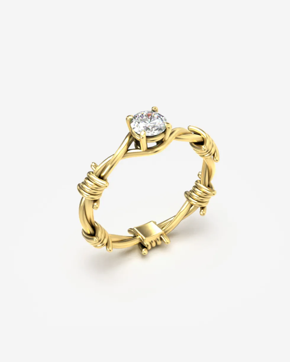 ANELLO SOLITARIO FILO SPINATO ORO CON DIAMANTE