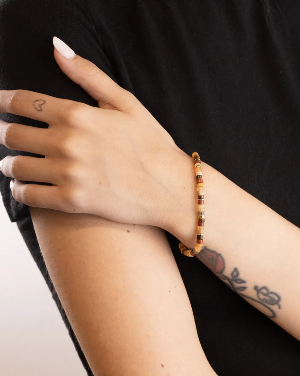 BRACCIALE CILINDRI MARRONI PLACCATO ORO