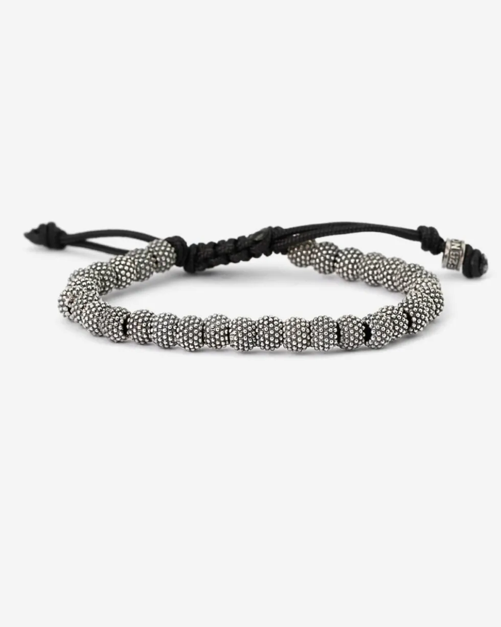BRACCIALE CORDA CON ELEMENTI TONDI PUNTINATI IN ARGENTO