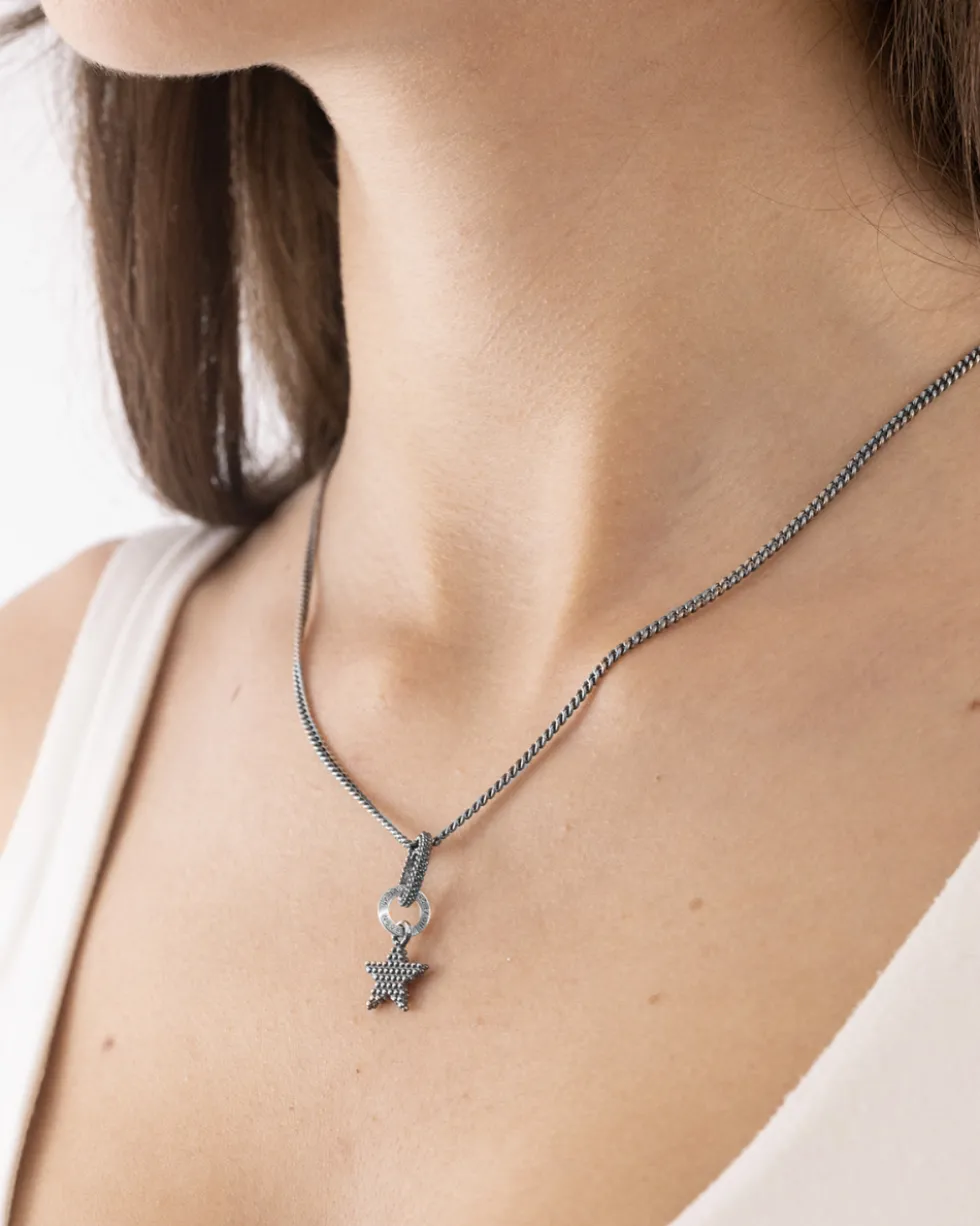 CIONDOLO MINI CHARM STELLA PUNTINATA IN ARGENTO
