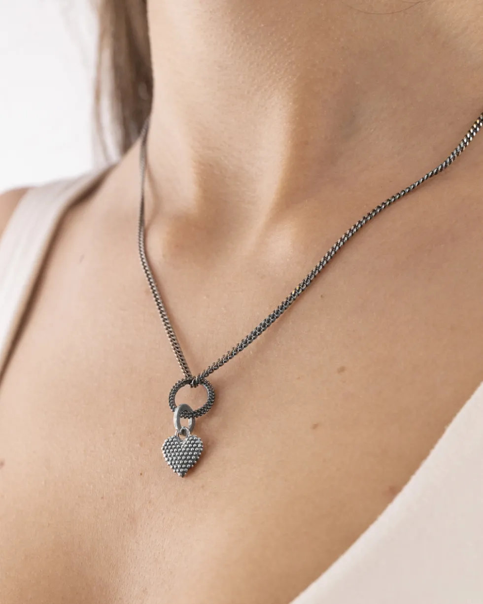 CIONDOLO MINI CHARM TESCHIO PUNTINATO IN ARGENTO